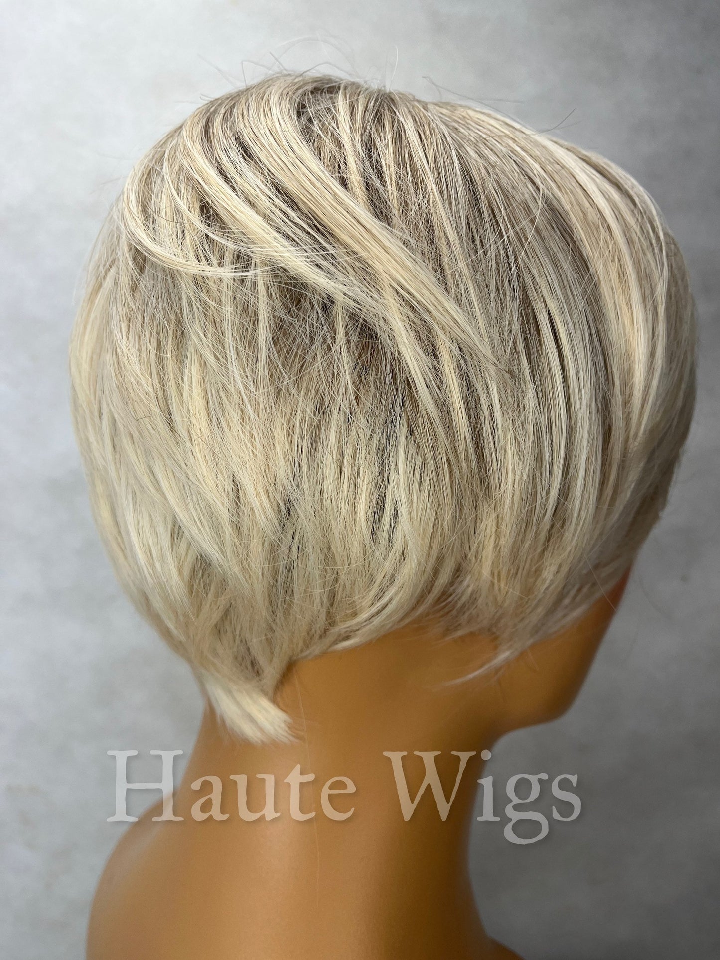Basic Instinct- 8 Inch Ash Blonde Cool Toned Dirty Ombre Brown Roots Wig With Fringe Bangs Short BOB Wavy Synthetic Hair Wigs