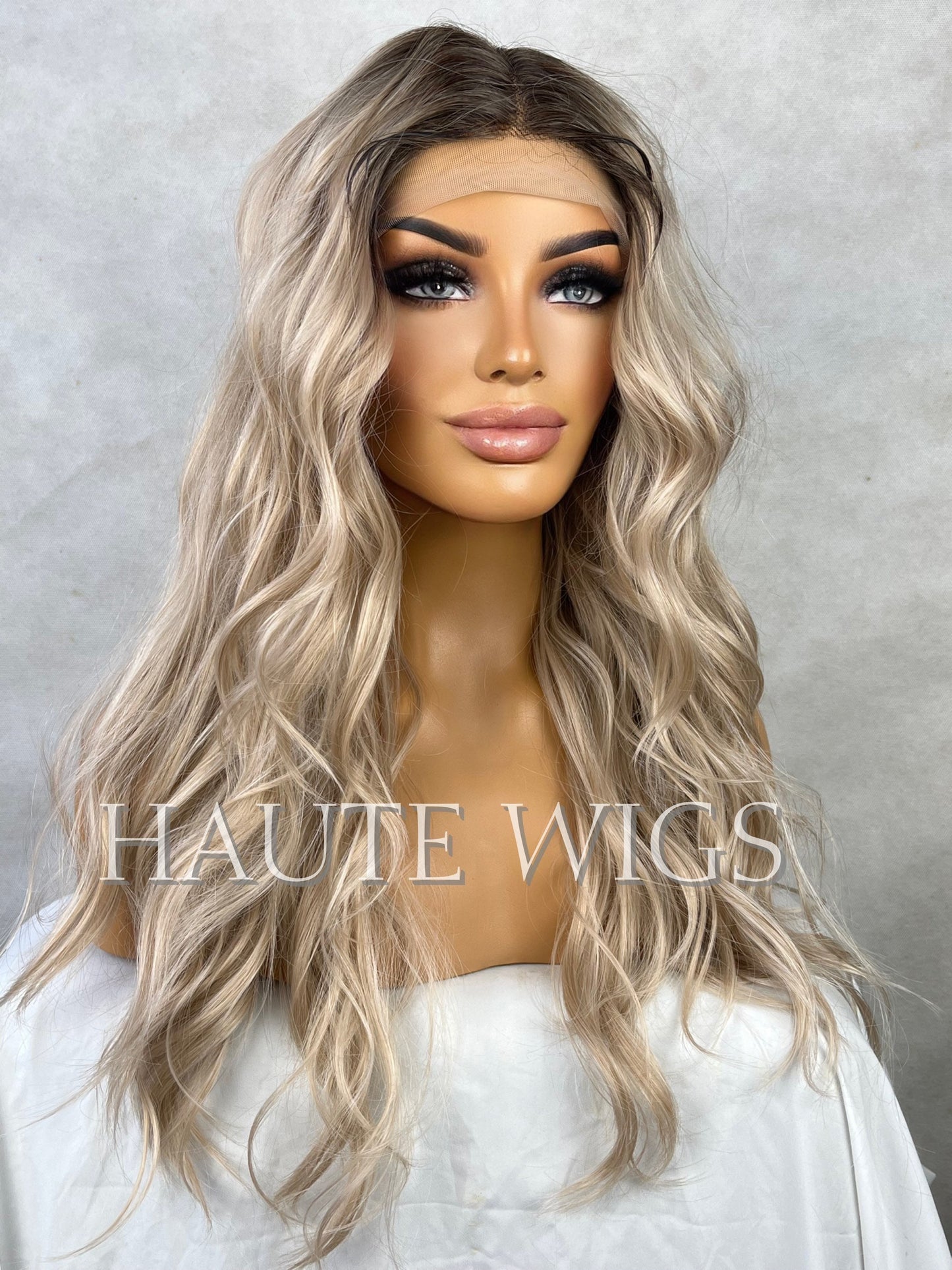 Riviera Ash Blonde Ombré Wig: 22 Inch Wavy Lace Front Wig