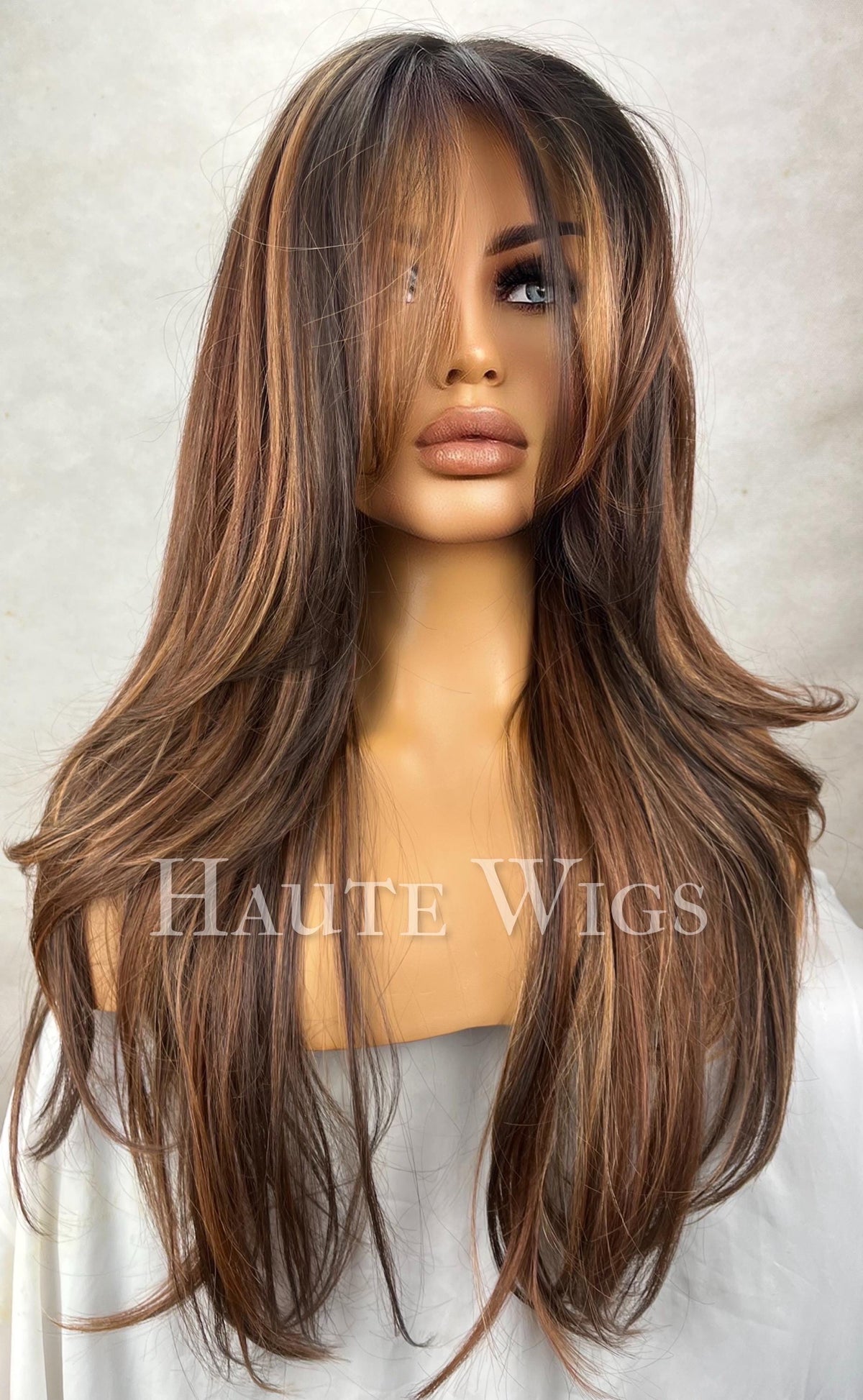 Monaco - Free part wide 26 Inch Brown Wig: Human Hair Blend, Lace Front, golden bronze Highlights