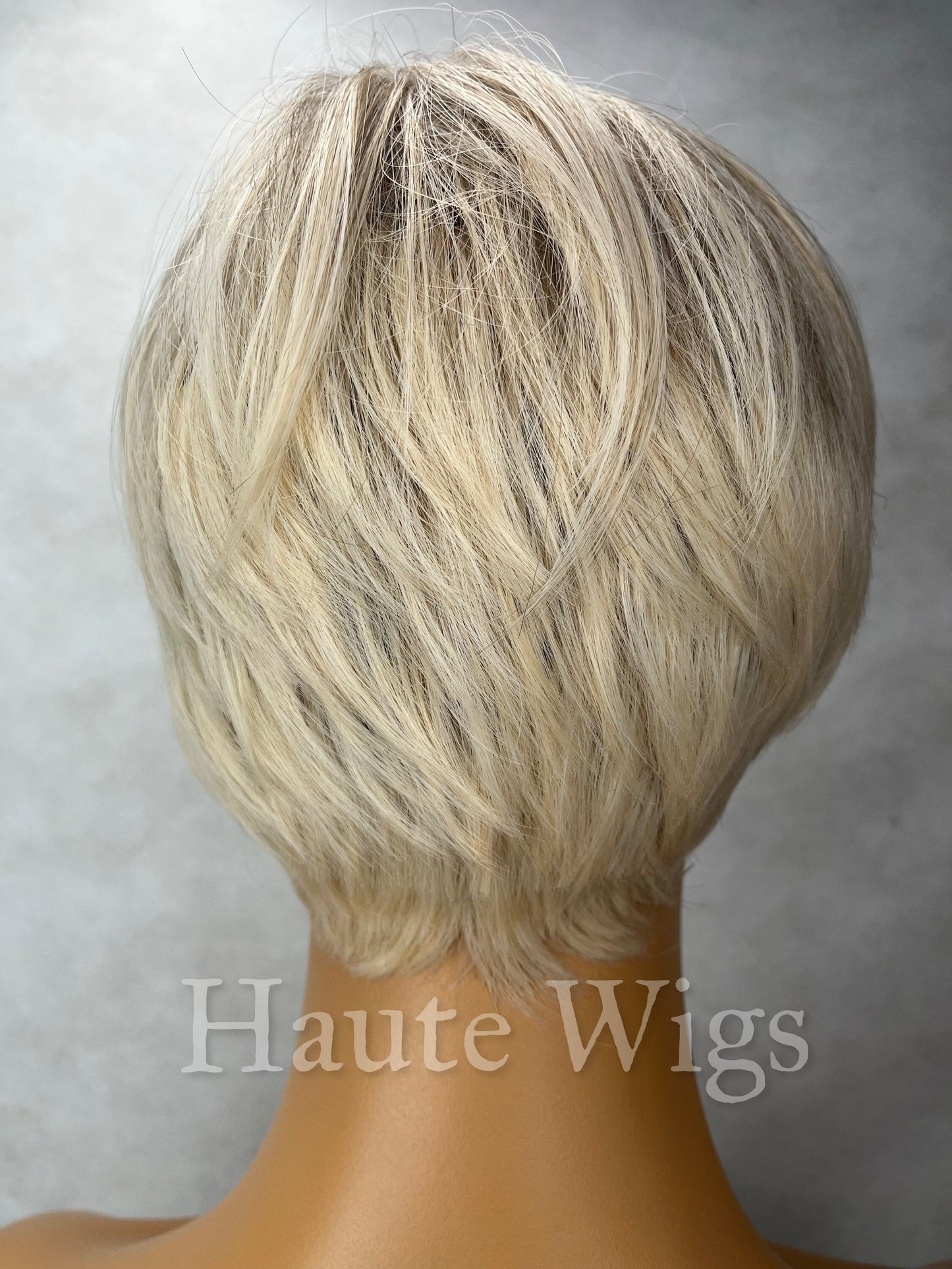 Basic Instinct- 8 Inch Ash Blonde Cool Toned Dirty Ombre Brown Roots Wig With Fringe Bangs Short BOB Wavy Synthetic Hair Wigs