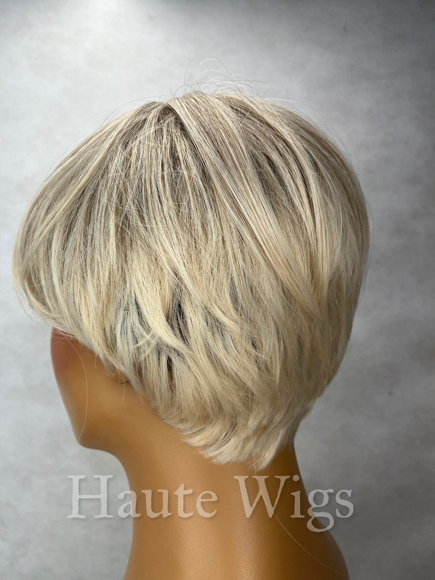 Basic Instinct- 8 Inch Ash Blonde Cool Toned Dirty Ombre Brown Roots Wig With Fringe Bangs Short BOB Wavy Synthetic Hair Wigs